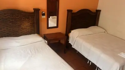 Cama o camas de una habitación en Hotel La Gavia