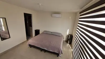 Cama o camas de una habitación en Casa Acapulco Playa Bonfil