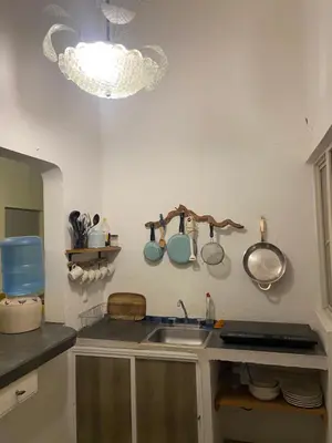 Una cocina o zona de cocina en DEPA IXTLAN alberca y cerca de playa