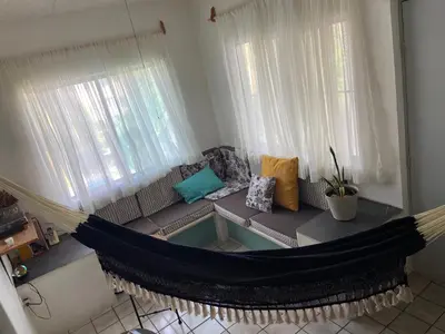 Zona de estar de DEPA IXTLAN alberca y cerca de playa
