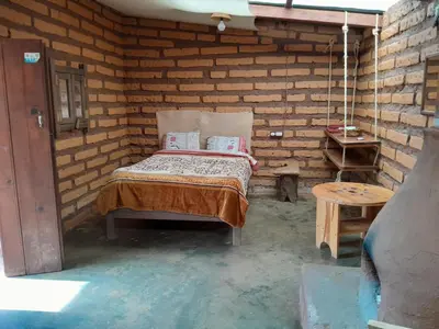 Cama o camas de una habitación en Ecocabañas luna y sol