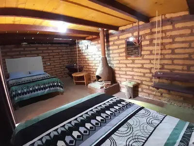 Cama o camas de una habitación en Ecocabañas luna y sol