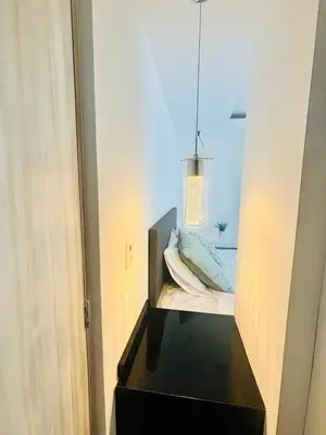 Cama o camas de una habitación en SUITE INTI vista al mar
