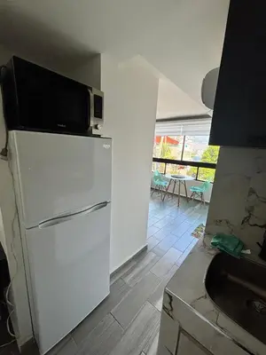 Una cocina o zona de cocina en SUITE INTI vista al mar