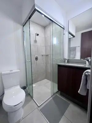 Un baño de ML002 - 2BR - 2BTh