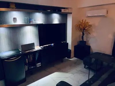 Una televisión o centro de entretenimiento en Penthouse Elysium