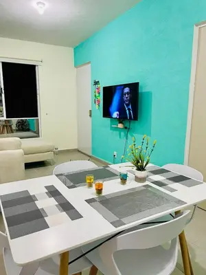 Una televisión o centro de entretenimiento en Departamento Acapulco Diamante