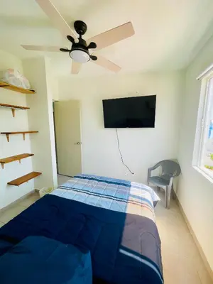 Cama o camas de una habitación en Departamento Acapulco Diamante