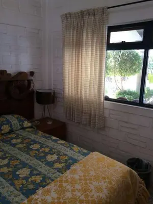 Cama o camas de una habitación en Enchanting Hacienda-Style Retreat in Cuernavaca