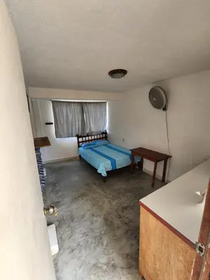 Cama o camas de una habitación en Habitaciones Nava