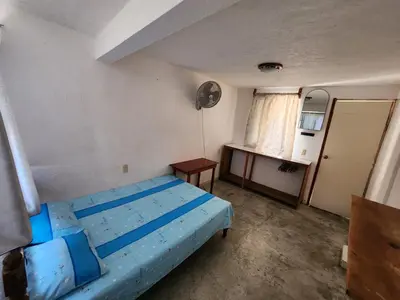 Cama o camas de una habitación en Habitaciones Nava