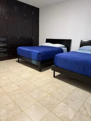 Cama o camas de una habitación en Casa del Árbol