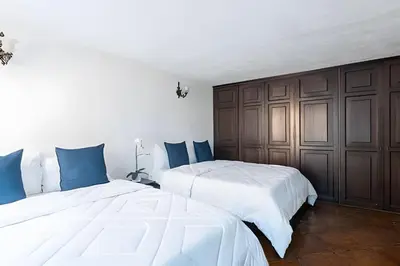 Cama o camas de una habitación en Amplia Casa en el Corazón del Centro | 4hab + Est