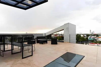 Un balcón o terraza de TORRE ARCARTI Internet alta velocidad y estacionamiento