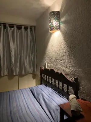 Cama o camas de una habitación en Habitaciones Nava