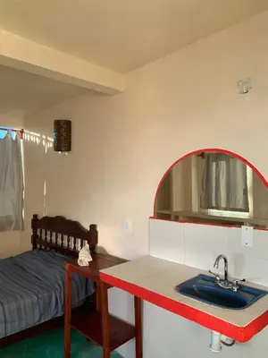 Cama o camas de una habitación en Habitaciones Nava