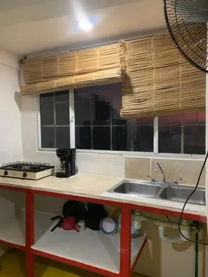 Una cocina o zona de cocina en Habitaciones Nava