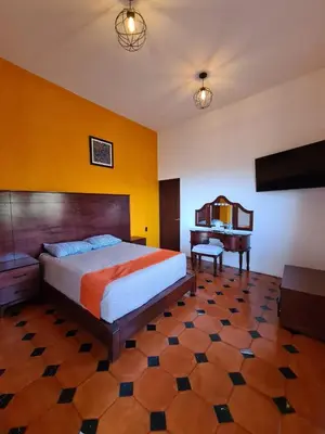 Cama o camas de una habitación en Hotel Alondra
