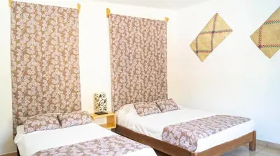 Cama o camas de una habitación en Sayaná House