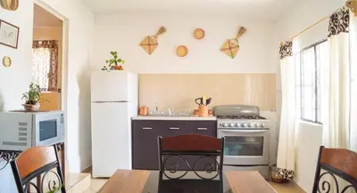 Una cocina o zona de cocina en Sayaná House