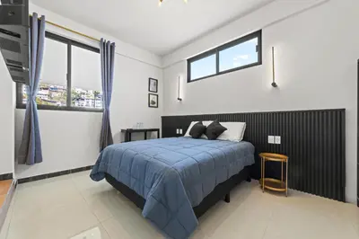 Cama o camas de una habitación en Hotel Boutique Árbol de la Vida