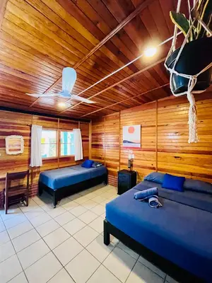 Cama o camas de una habitación en Costa Rentals Palmar & Wasi