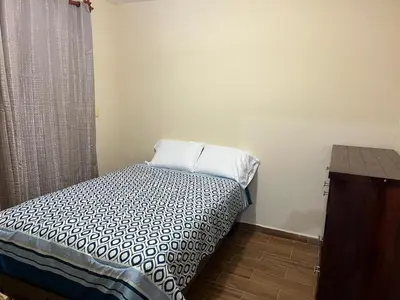 Cama o camas de una habitación en CASA FAMILIAR en SAN ANTONIO de la CAL 1