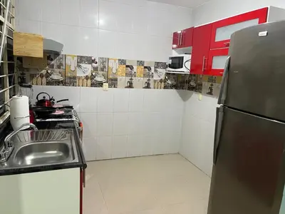 Una cocina o zona de cocina en CASA FAMILIAR en SAN ANTONIO de la CAL 1