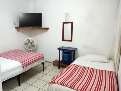 Cama o camas de una habitación en Hostal Zipolite Arteaga