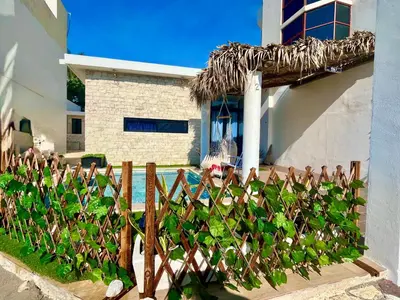 Jardín al aire libre en Casa de Playa en Antón Lizardo con alberca privada y club Playa