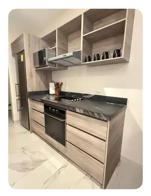 Una cocina o zona de cocina en Relajante y acogedor