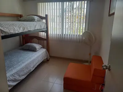 Cama o camas de una habitación en Casa en condominio 2R alberca compartida