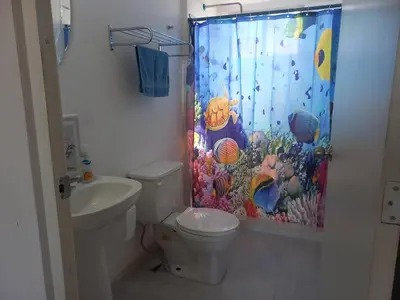 Un baño de Casa en condominio 2R alberca compartida