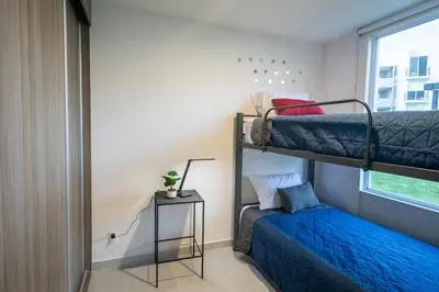 Cama o camas de una habitación en Depa Aria Puebla