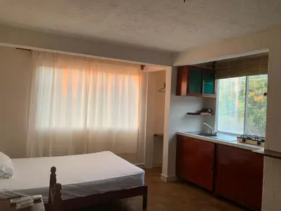 Una cocina o zona de cocina en Habitaciones Nava