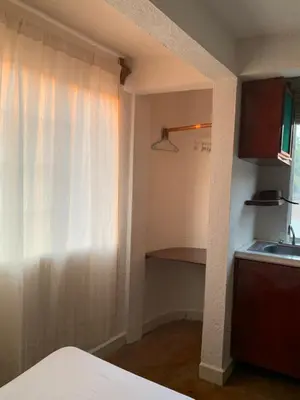 Cama o camas de una habitación en Habitaciones Nava