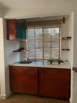 Una cocina o zona de cocina en Habitaciones Nava
