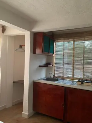 Una cocina o zona de cocina en Habitaciones Nava