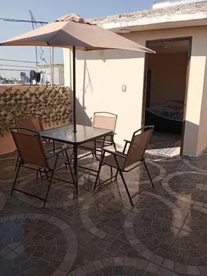 Un balcón o terraza de Recámara céntrica funcional