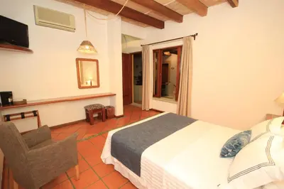 Cama o camas de una habitación en Hotel Casa Vertiz