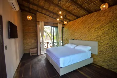 Cama o camas de una habitación en Norock Club and Beach