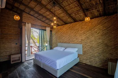 Cama o camas de una habitación en Norock Club and Beach
