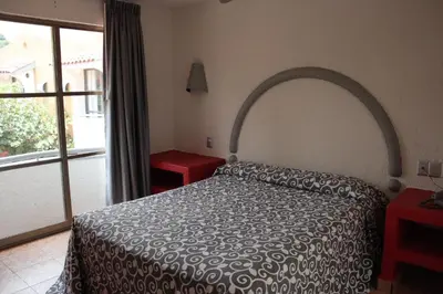 Cama o camas de una habitación en Hotel Real Ocotepec