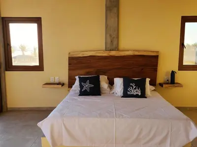 Cama o camas de una habitación en Casa de Playa