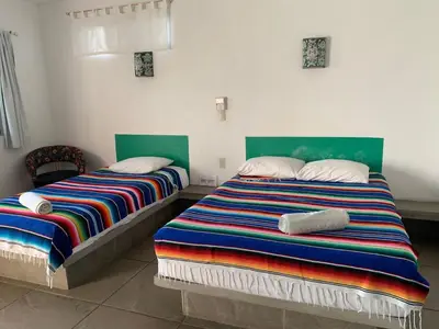 Cama o camas de una habitación en hotel las olas zicatela