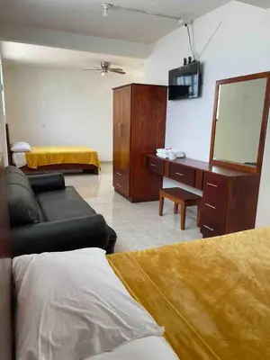 Cama o camas de una habitación en Casa con alberca