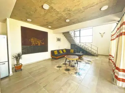 Zona de estar de Punta Conejo Casa Cielo frente a la playa