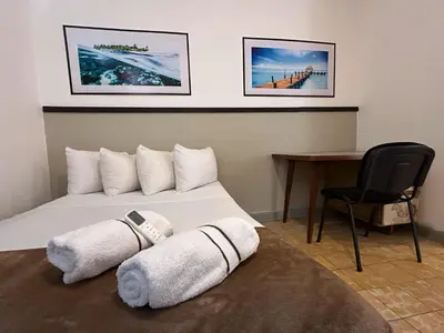 Cama o camas de una habitación en Departamento a 4 min del Centro