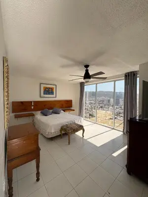 Cama o camas de una habitación en Departamento en Lomas de Costazul
