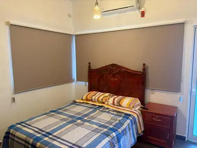 Cama o camas de una habitación en Cuartito Modesto del precioso
